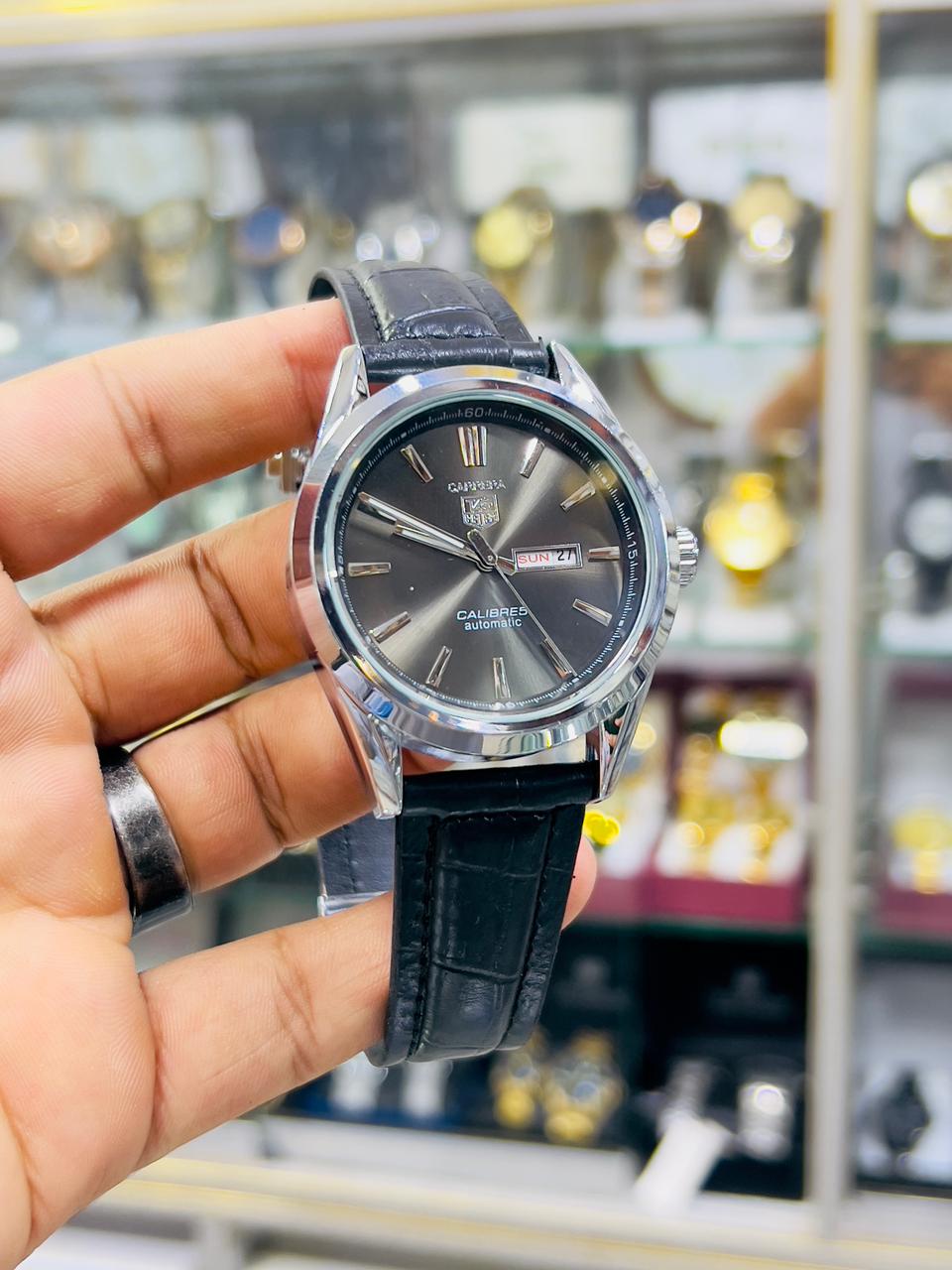Carrera Automatic - black dial & Black Leather Strap with Day and Date